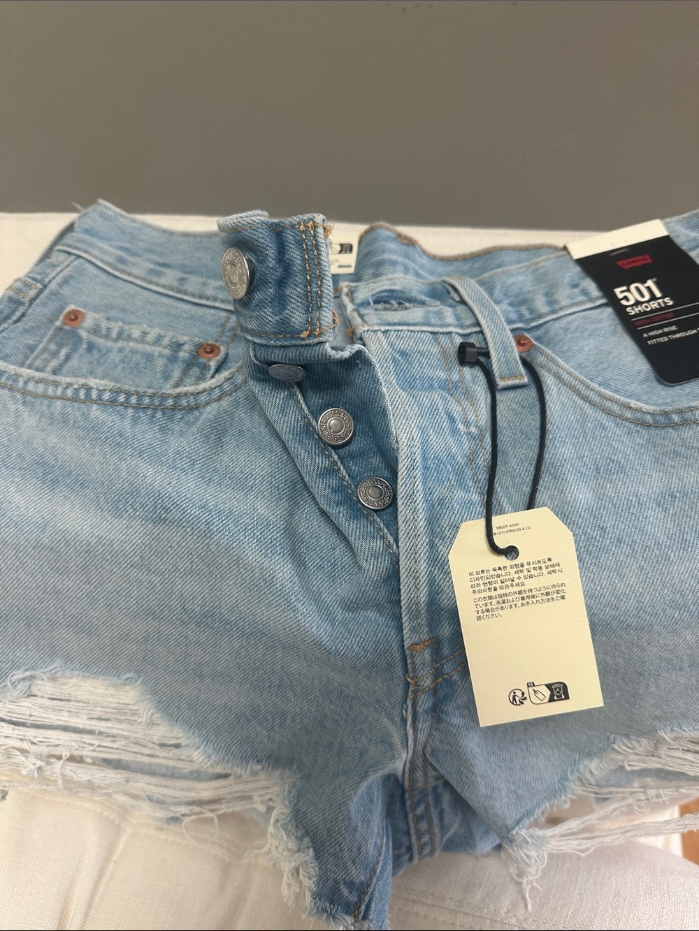 Levi's Light Blue Distressed Denim Shorts